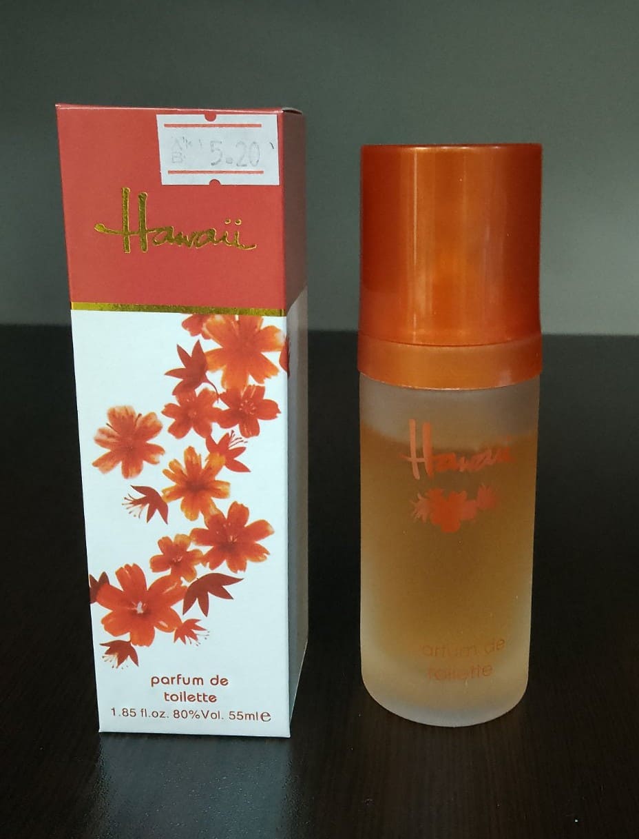 Дамски парфюм Hawaii Parfum de Toilette, 55 мл, с екзотичен дизайн и цветя в червено и оранжево върху опаковката.