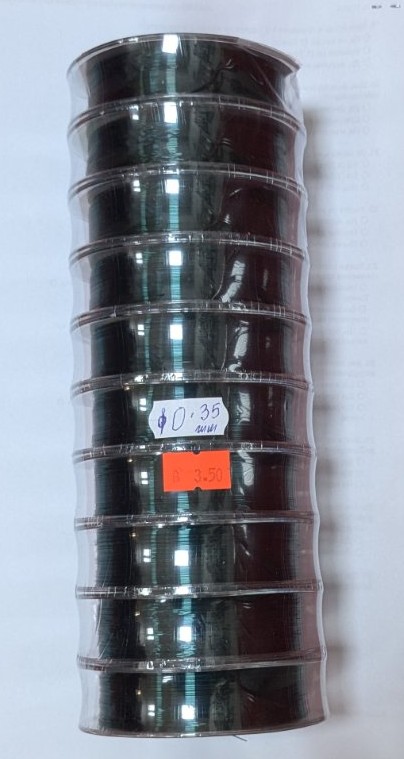 Макара с риболовно влакно CARP Super Line 0.35 мм, 100 м, 12 кг от Rico Marina с изображение на риба и отблясъци.1