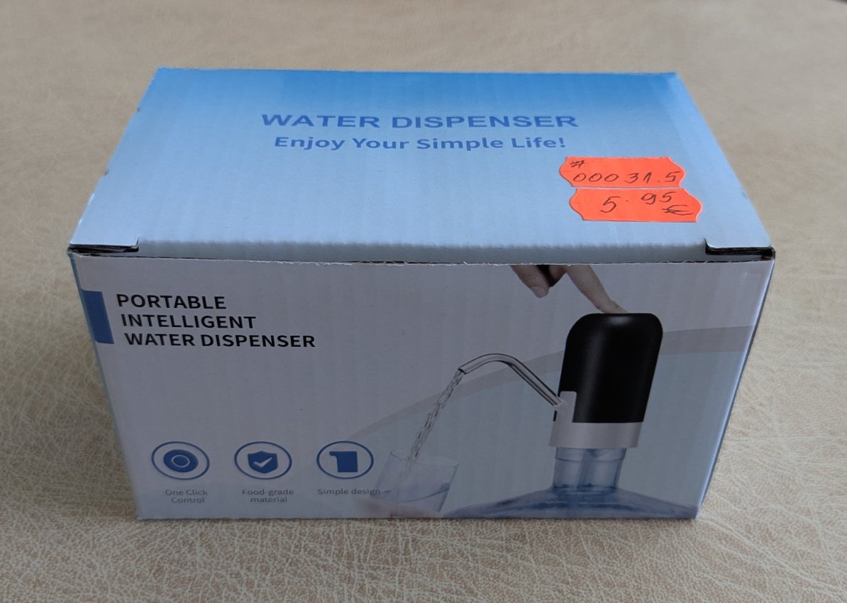 Електрическа помпа за вода Water Dispenser MX-801 в кутия, подходяща за бутилки и туби с вода.